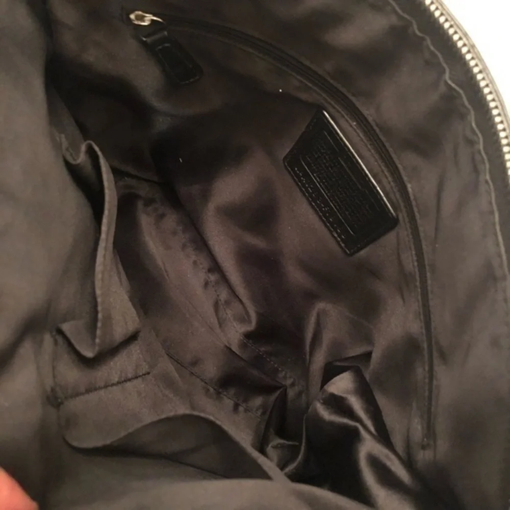 Coach black patent leather signature stitched tote
